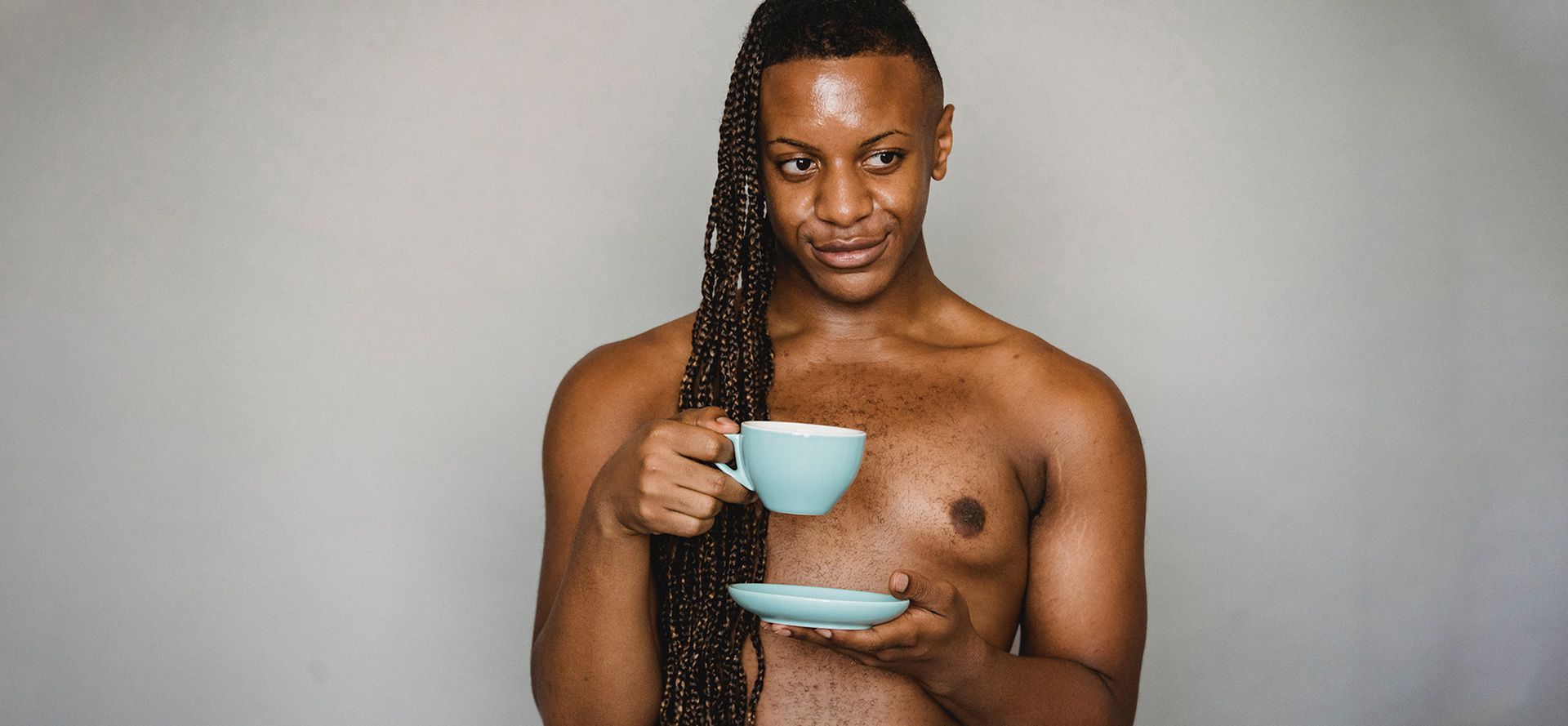 Femboy with cup of tea.
