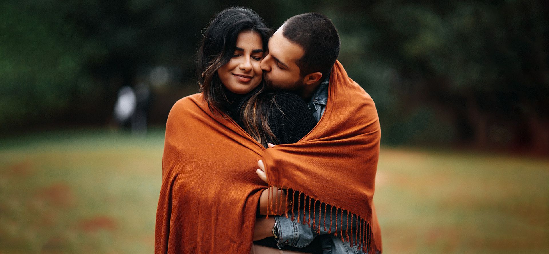 Man hugging woman.