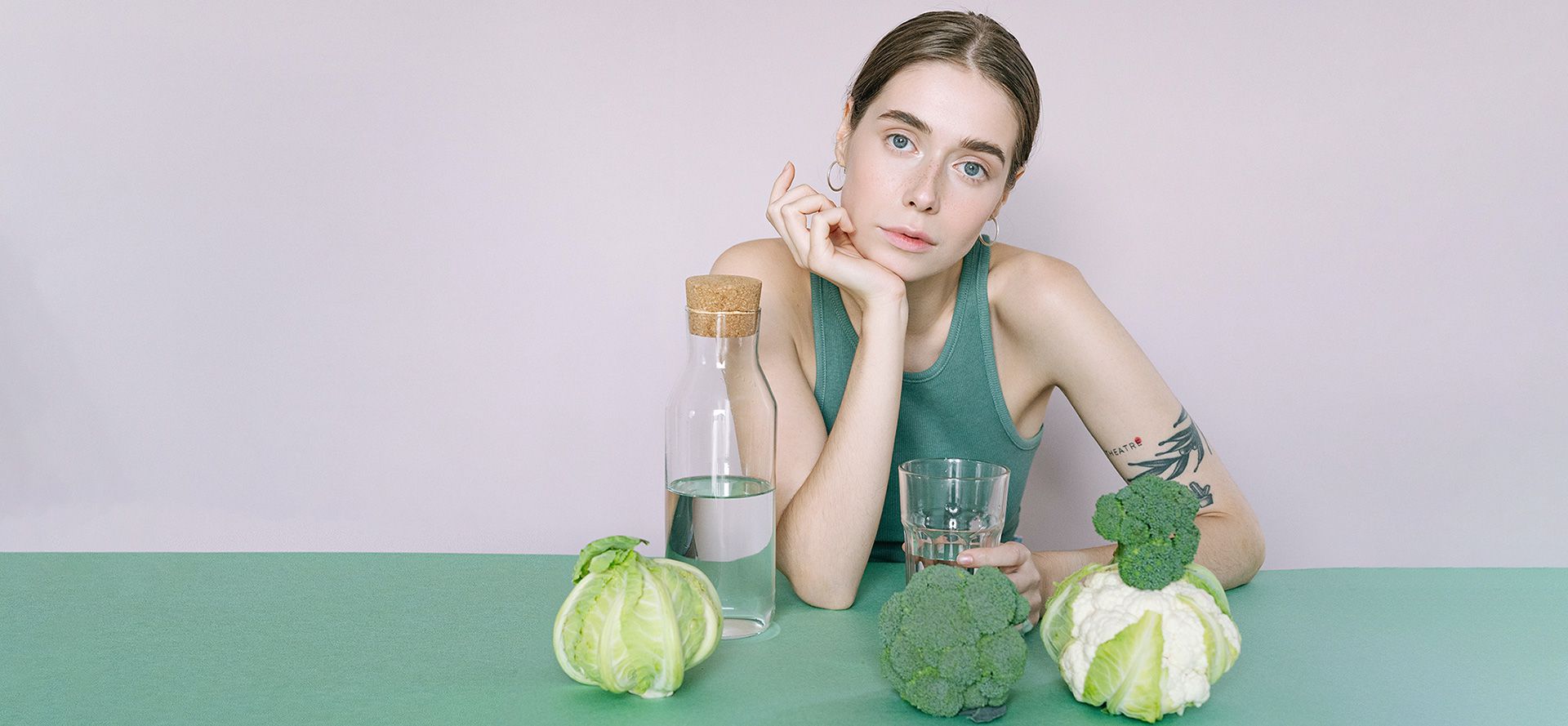 Vegan woman with vegetables.