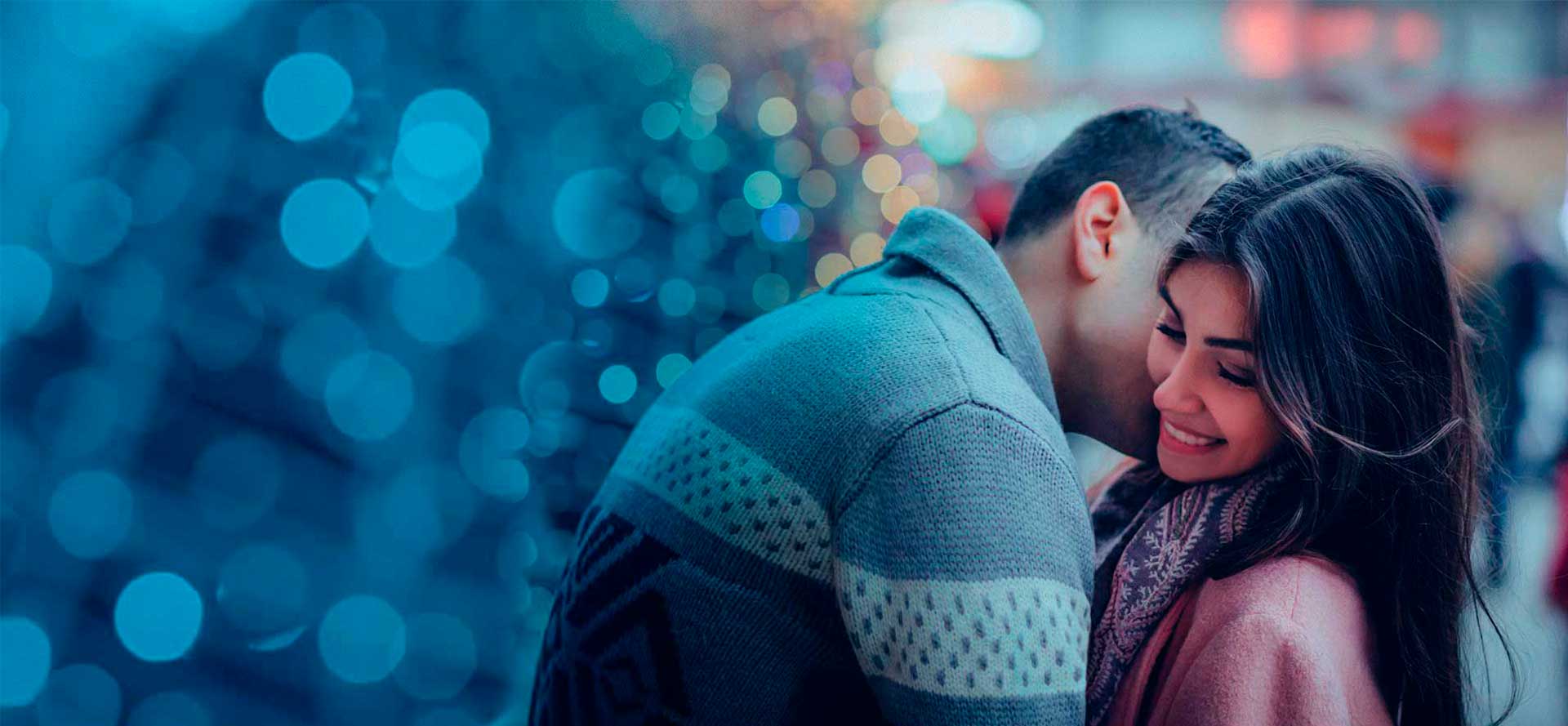 Man Kissing Women's Neck.