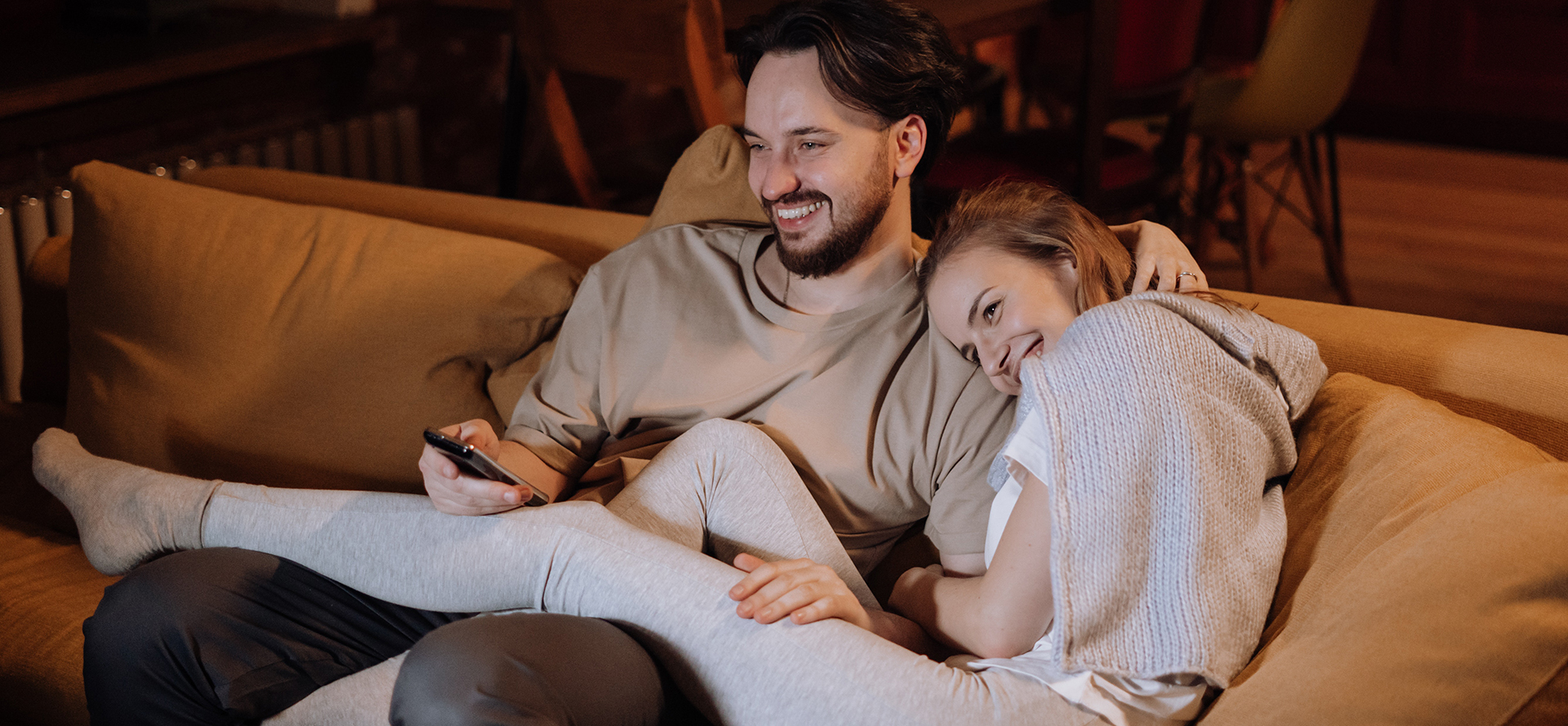 A couple is watching an anime.