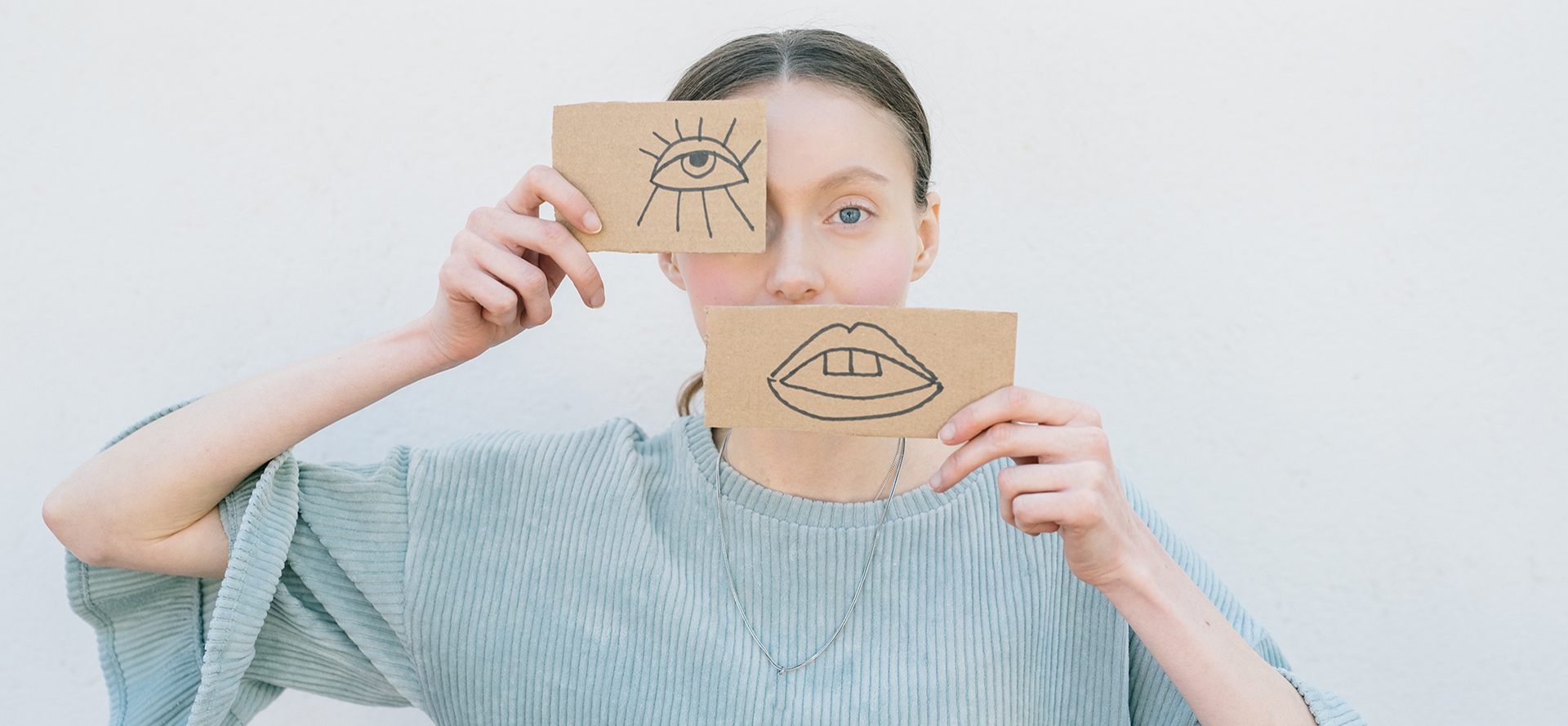 The girl depicts emotional disability using pictures.