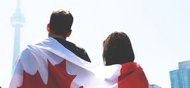 Couple with canadian flag.