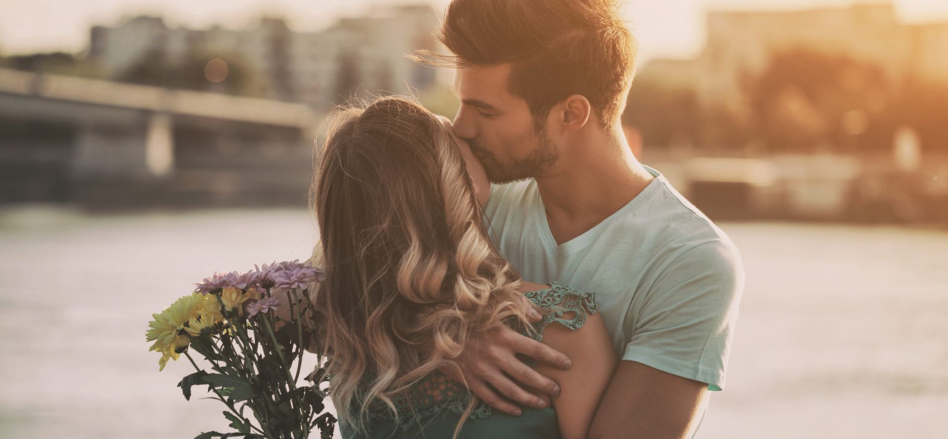 A man gave flowers to a woman.