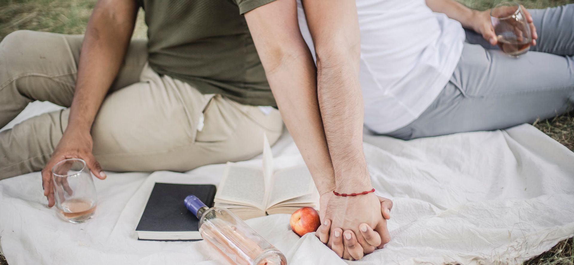 Couple holding hands.