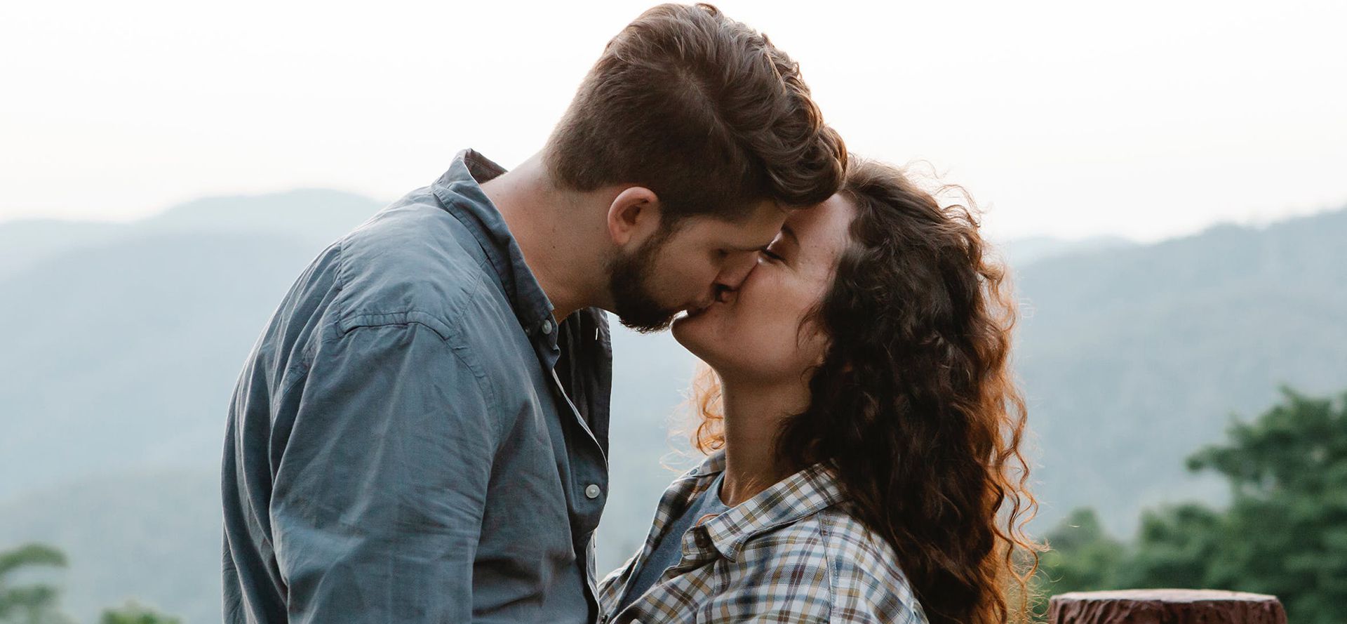 Man and woman kissing.