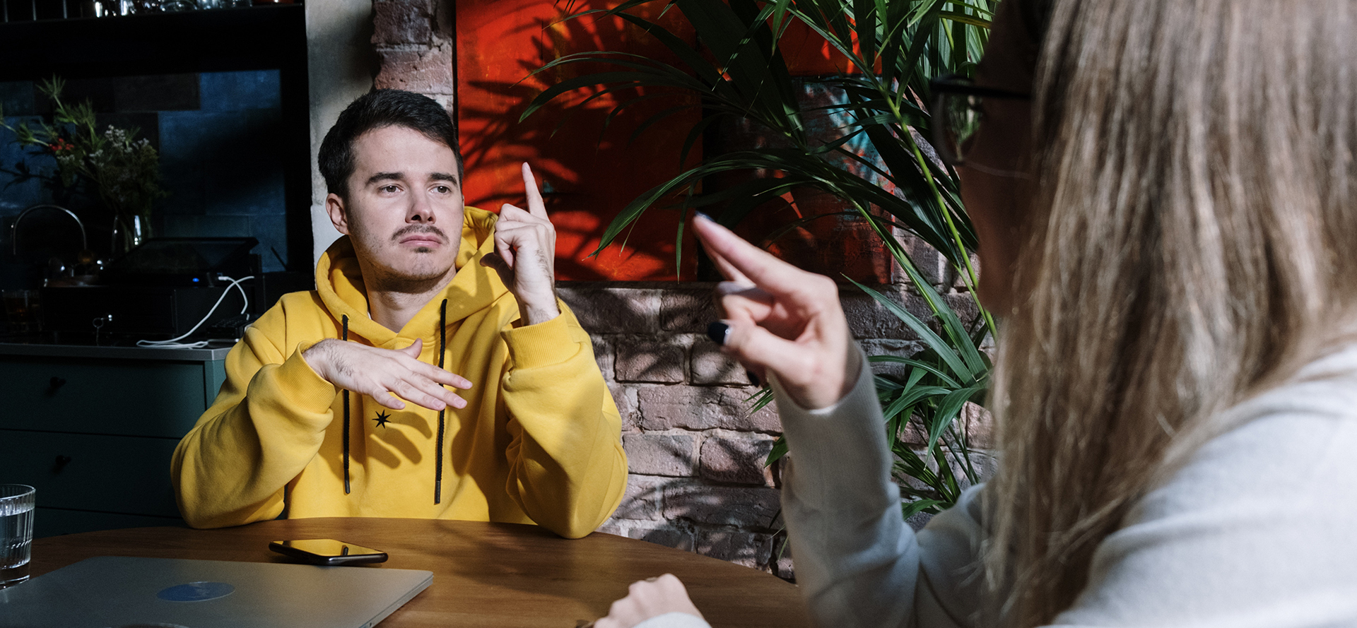 A couple of deaf people on a date.