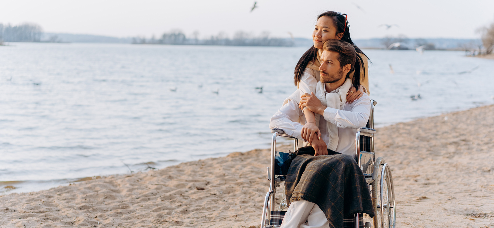 Woman on a romantic date with a disabled man.