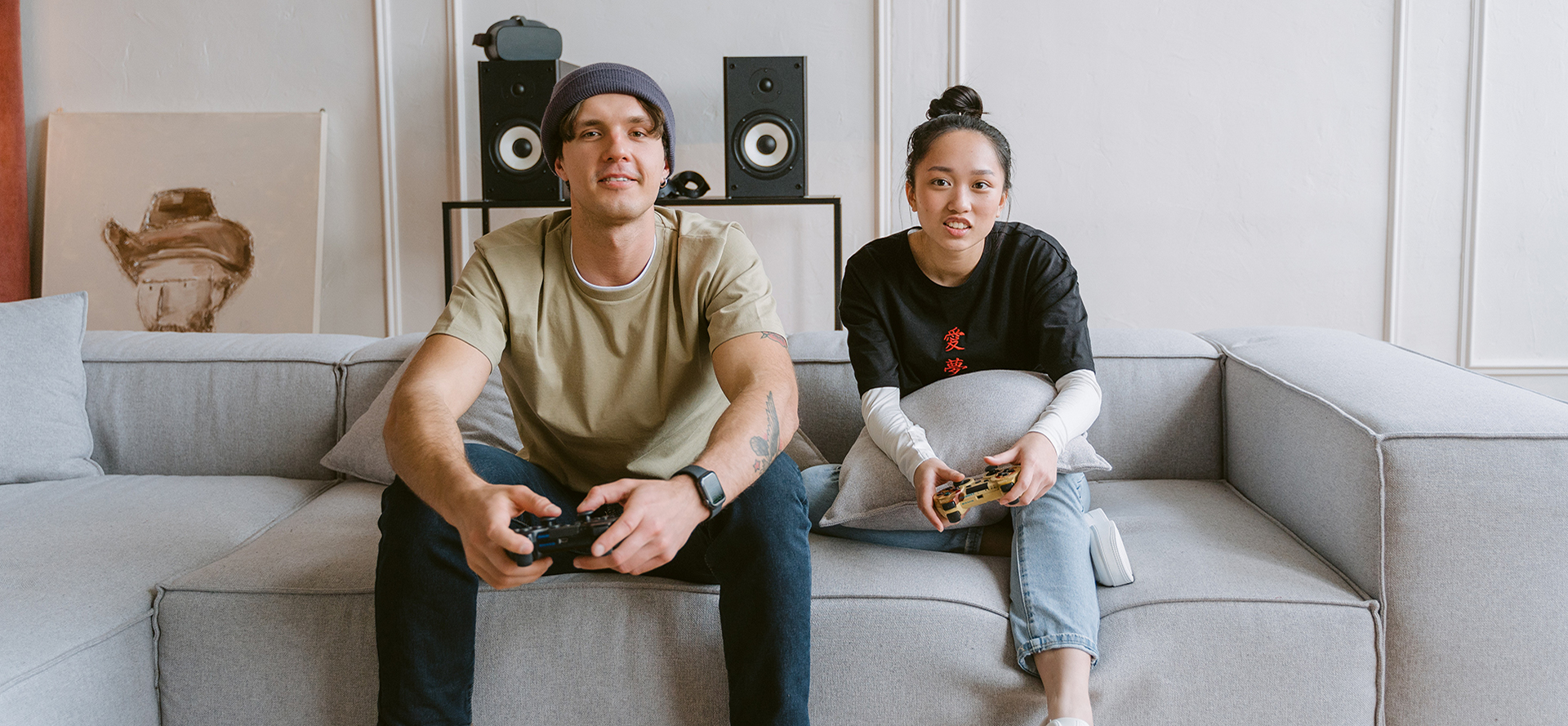 Single geeks on a date are playing on a console.