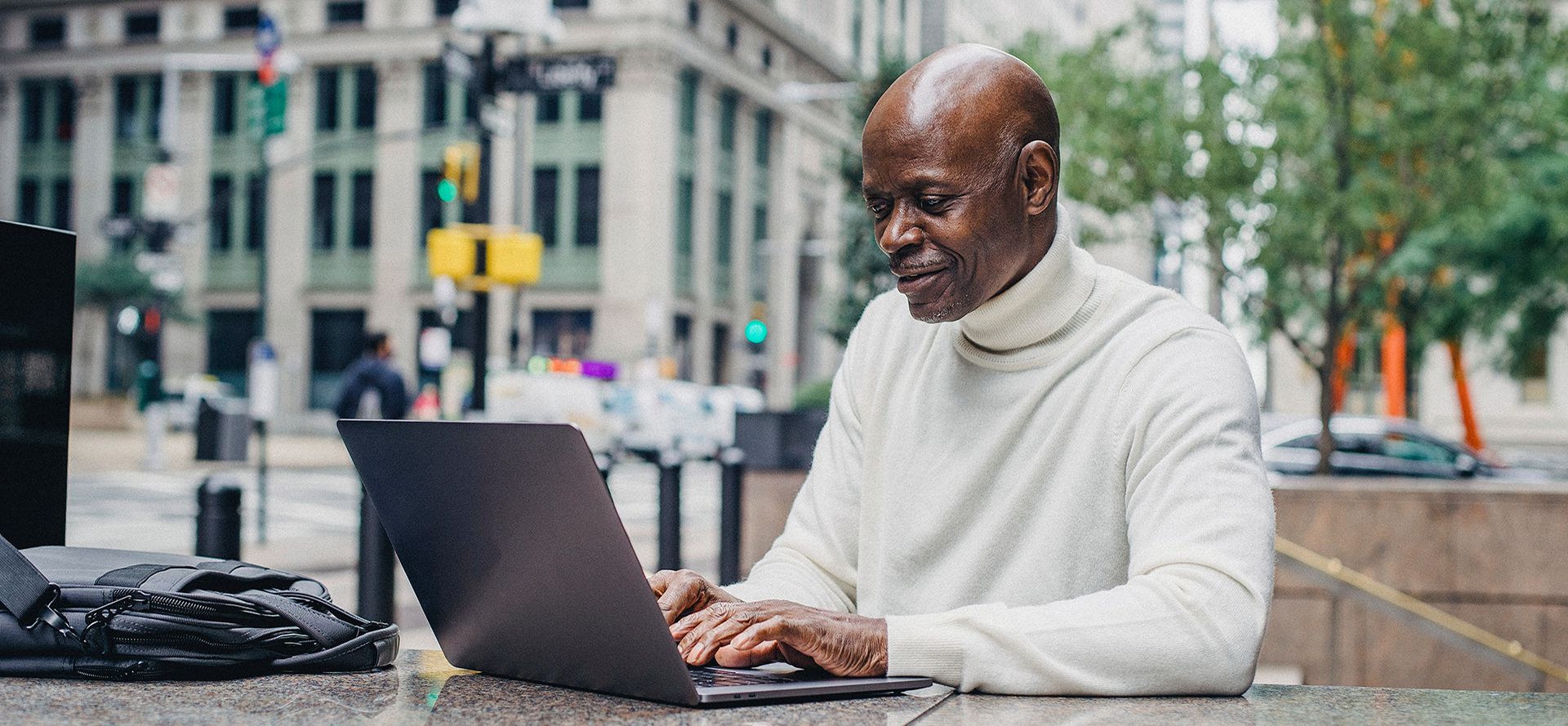 A rich man sitting on dating sites.