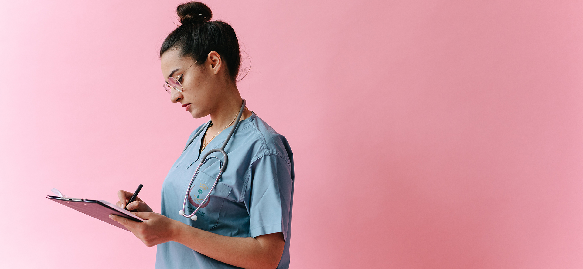 The nurse is filling out the forms.