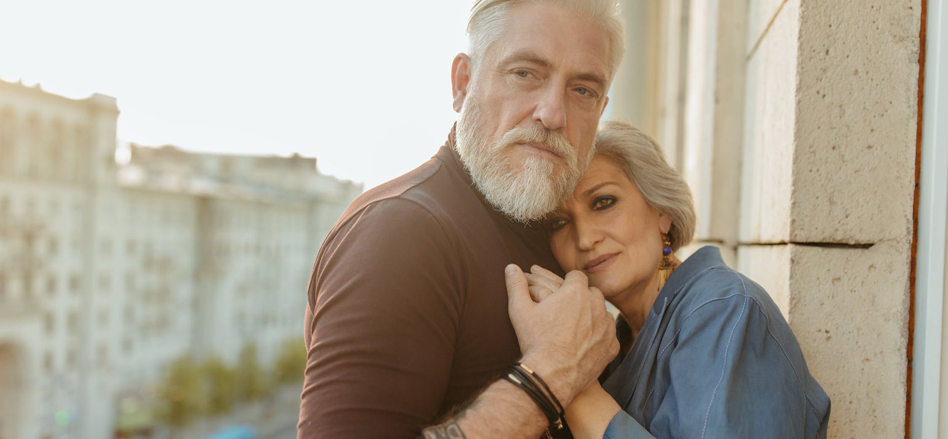 Widower holding woman hands.